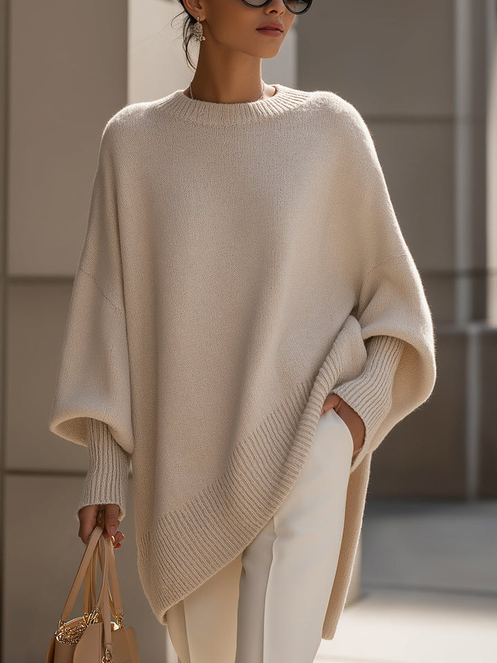 AVA – ASYMMETRICAL OVERSIZED SWEATER