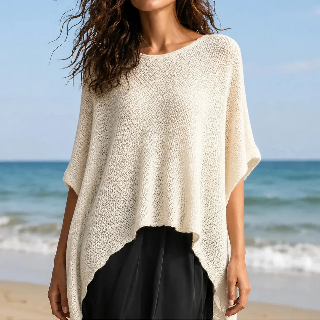 Solvera – Open Knit Batwing Top with Asymmetrical Hem