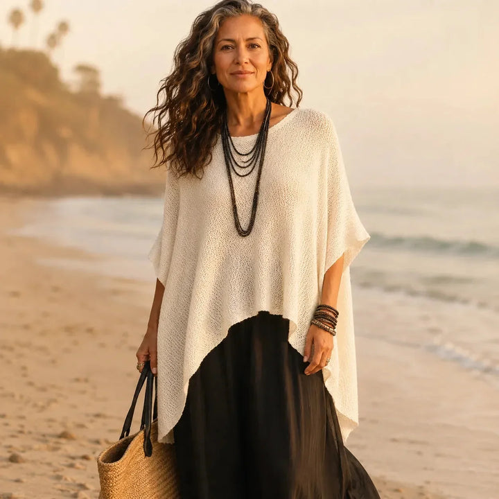 Solvera – Open Knit Batwing Top with Asymmetrical Hem