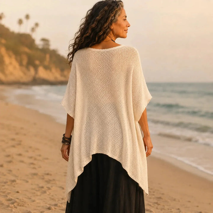 Solvera – Open Knit Batwing Top with Asymmetrical Hem