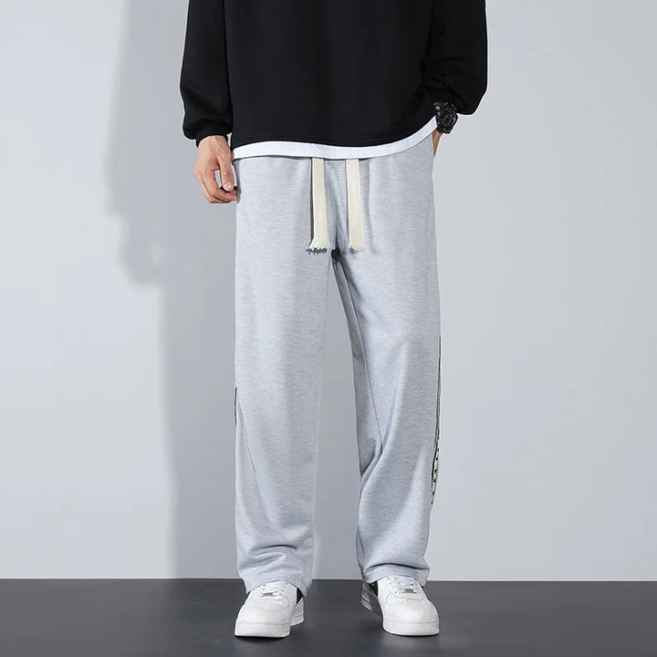ARCANE STRIPED PANTS