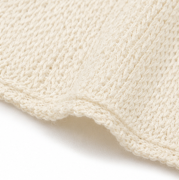 Solvera – Open Knit Batwing Top with Asymmetrical Hem